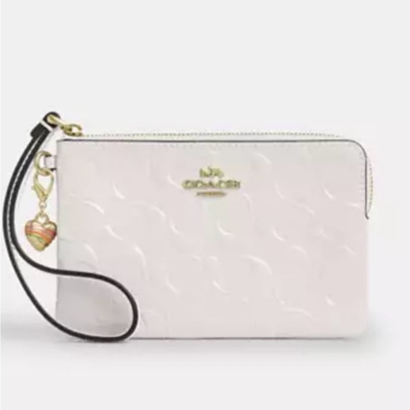 Coach Handbags - 🌸 Coach NWT Chalk Corner Zip Wristlet In Signature Leather With Heart Charm